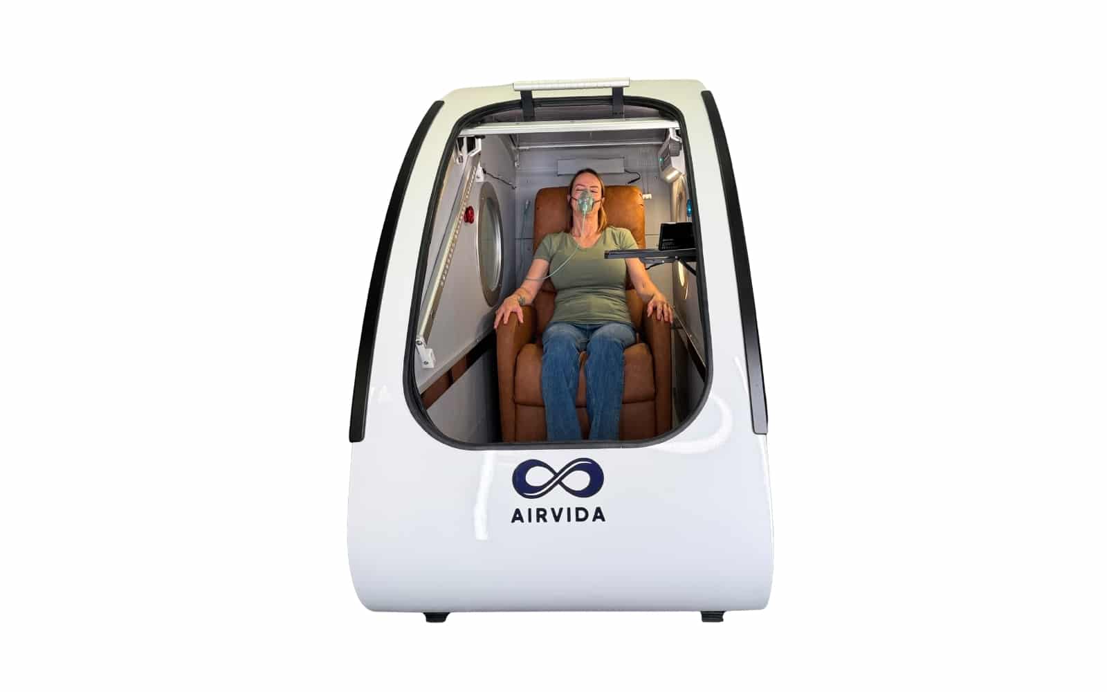 Patient receiving hyperbaric oxygen therapy inside a hyperbaric chamber at Fields Family Chiropractic